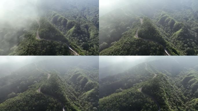 鸟瞰山坡上的道路，山的最高点在完全被森林覆盖的山脉中是美丽的，克卢德火山和蓝色的火山口，克卢德火山，