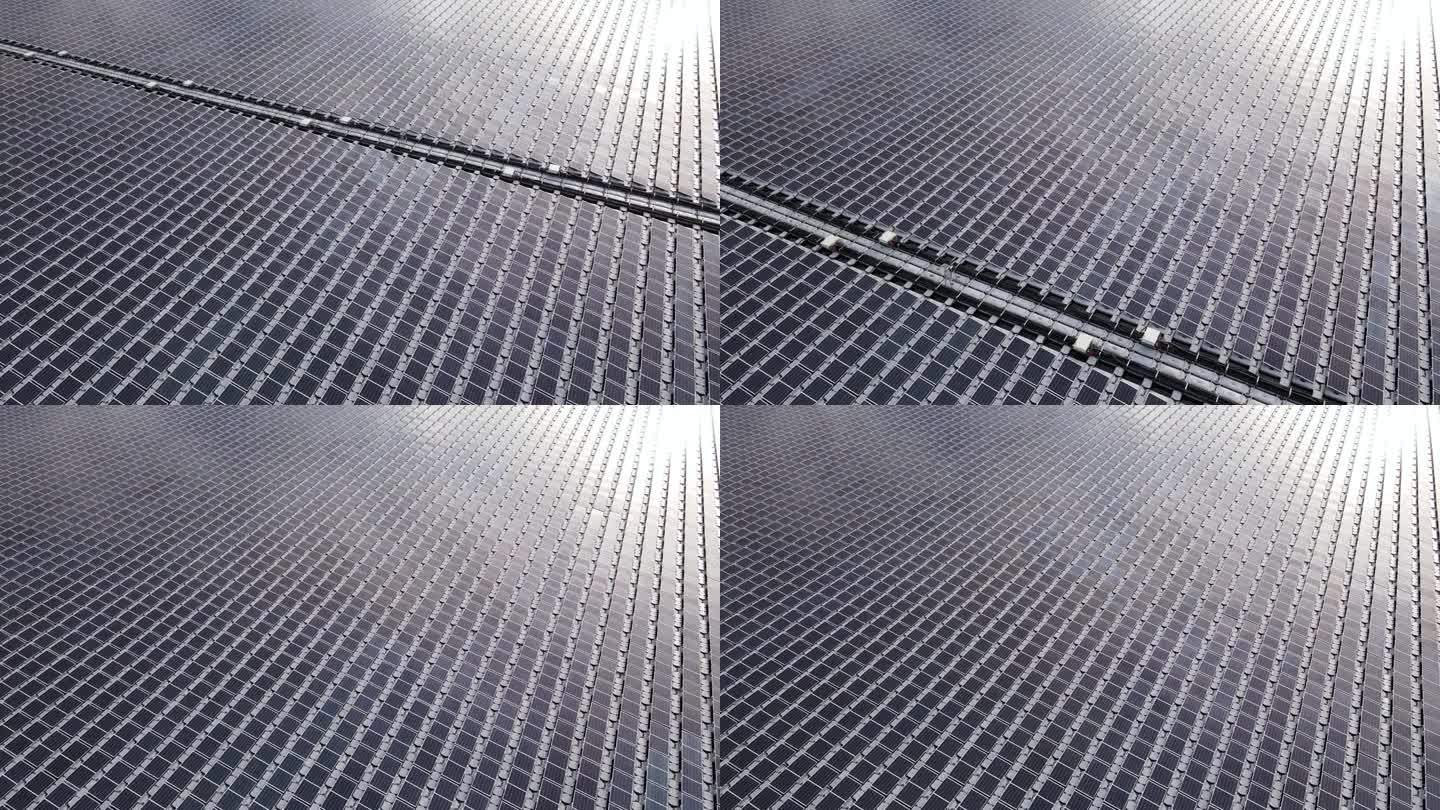 湖上发电站一排排漂浮的太阳能电池板，航拍视频