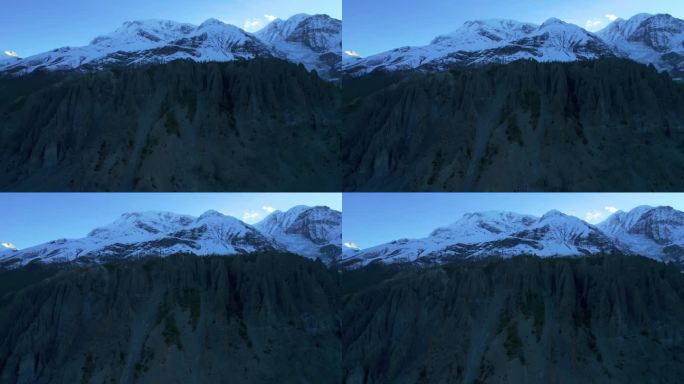 空中鸟瞰喜马拉雅山脉全景，雪峰和山后的太阳。雄伟壮丽的尼泊尔喜马拉雅山脉全景。