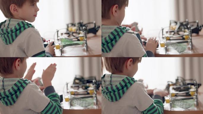 孩子们玩机器人玩具，男孩使用电线遥控玩干机器人玩具在家里。提高工程技能和想象力的活动。教育的创新和技