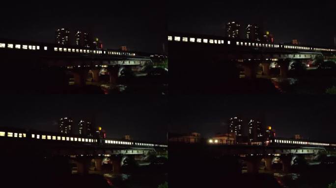 夜晚的火车经过铁路桥
