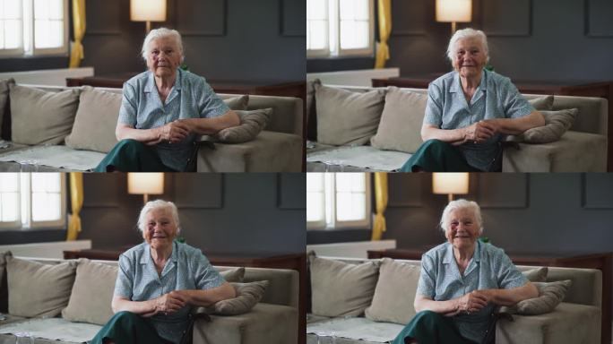 80年代的老奶奶，脸上有老年斑和皱纹，在家里看着镜头微笑