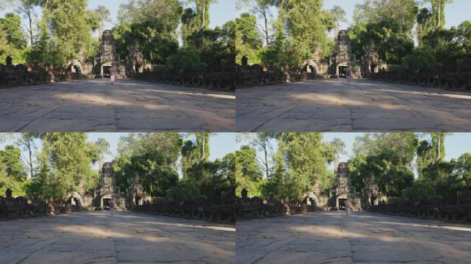 吴哥窟建筑群中的柏可汗寺，树木丛生，柬埔寨