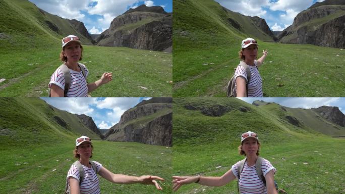 一位兴高采烈的女游客正在用视频记录她的山麓自驾游。自拍的观点
