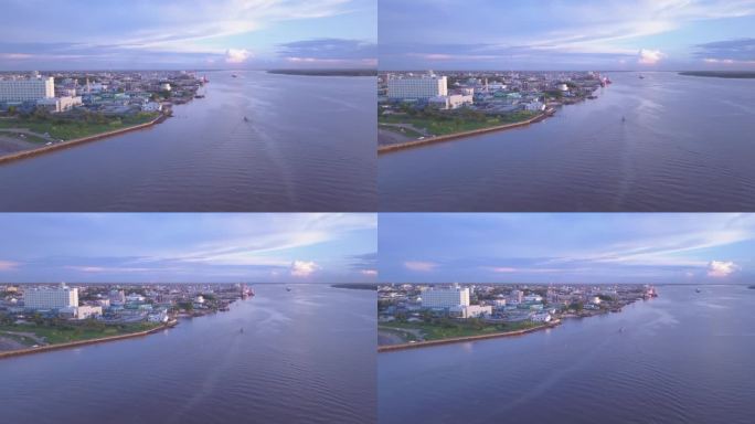 德米拉河，乔治城圭亚那-揭示拍摄-空中
-德米拉河来自大西洋
揭秘圭亚那首都。

一天的捕鱼后，一艘