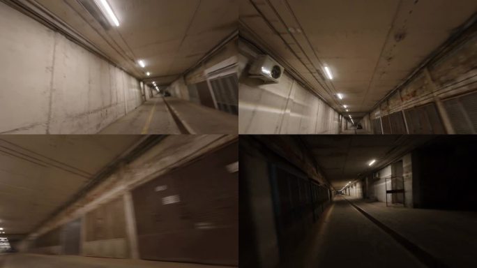 无人机飞行第一人称视角飞行通过一个黑暗的隧道小巷