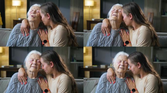 支持下，女儿抱着伤心的母亲老祖母给予同情