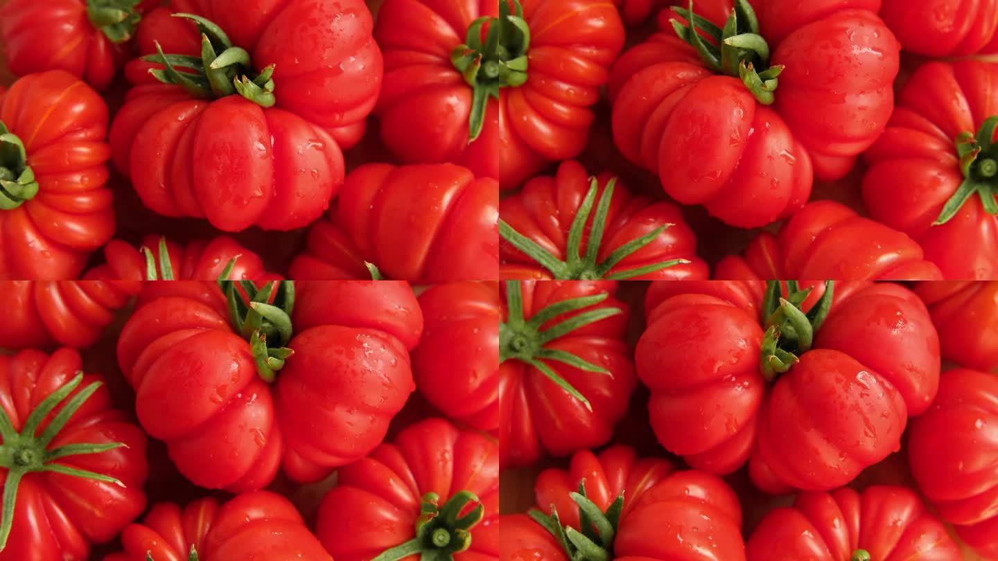 美味的红番茄背景。蔬菜市场，农业有机农场。新鲜潮湿的西红柿近距离旋转。营养，饮食，素食。健康饮食食材