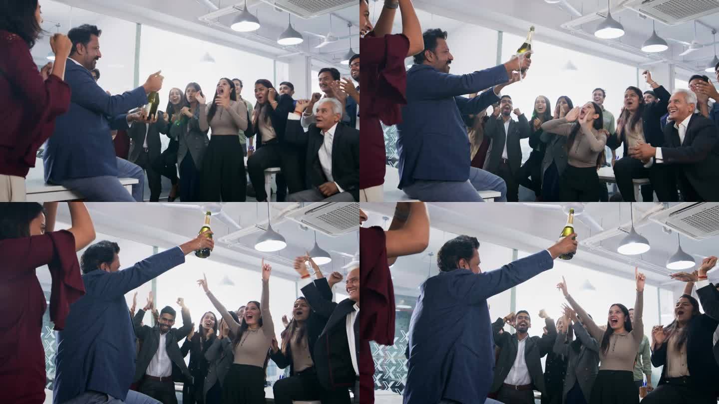 一群办公室员工一起开香槟庆祝