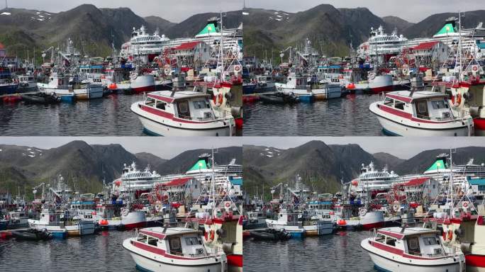 日落时分，挪威著名的历史渔村港口里的传统渔船。极性运输。在挪威钓鱼。挪威的霍宁斯瓦格市。巡游到北开普