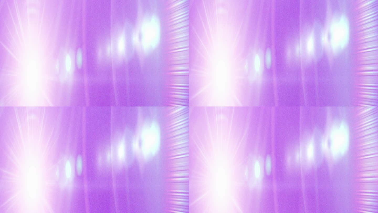 渐变运动在紫色与扭曲的镜头光晕