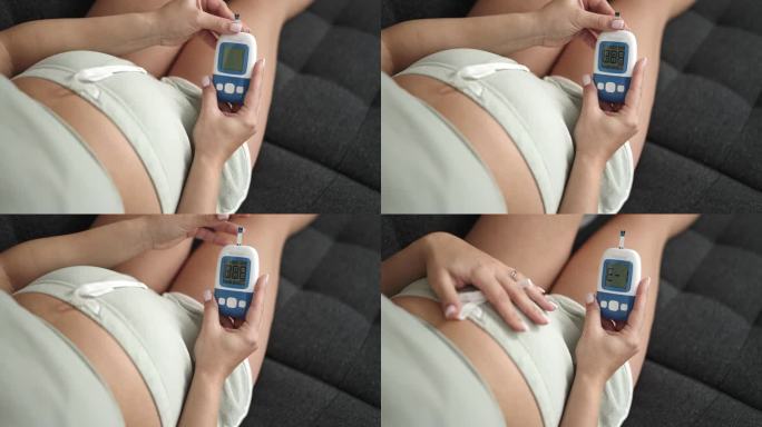 年轻孕妇在家摸肚子测血糖