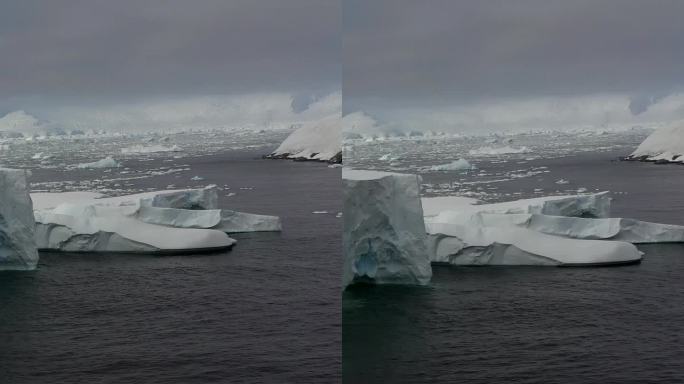 垂直视频美丽的南极海洋与冰，雪，冰山。