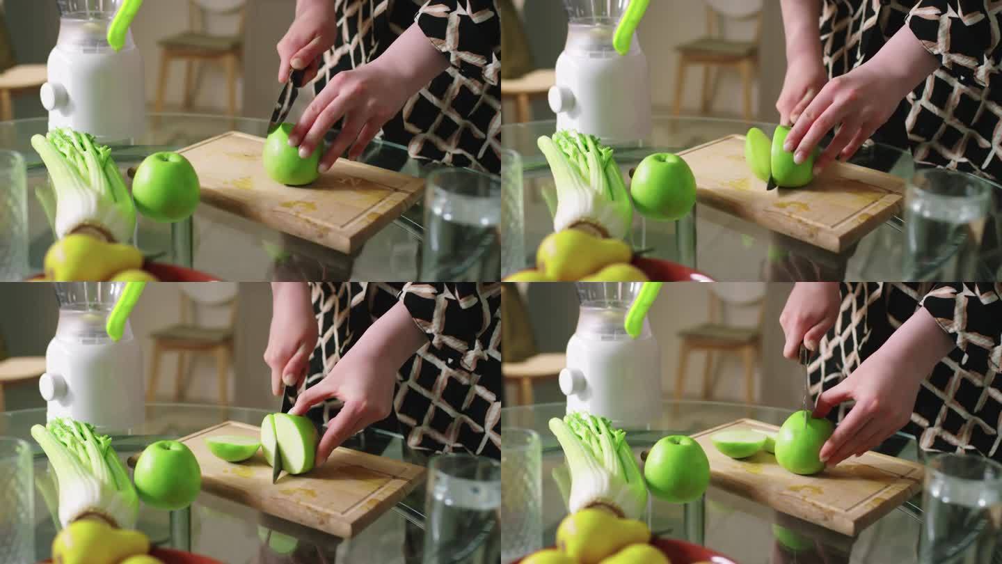女性用手切苹果做冰沙