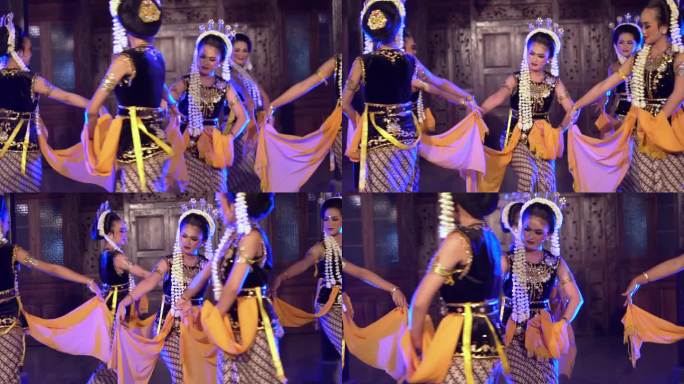 一群爪哇舞者戴着茉莉花在舞台上翩翩起舞