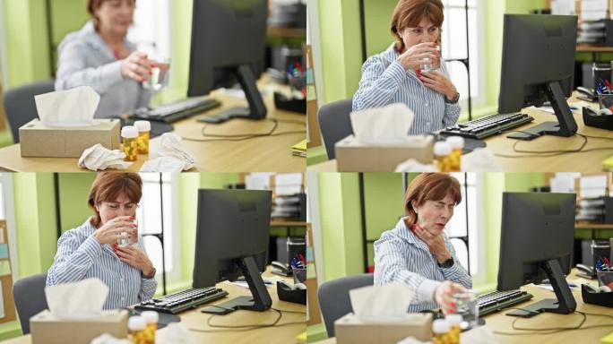 中年女企业职员在办公室喝水生病
