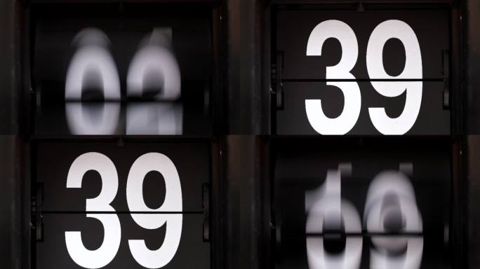 翻转时钟告诉时间从49号到39号停止时间数字变化如此之快。