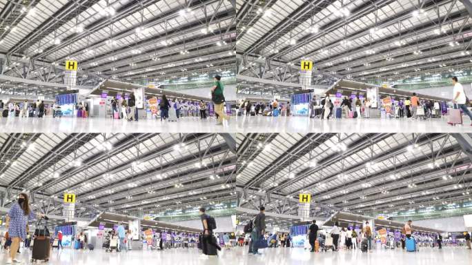 许多游客在机场步行登机。