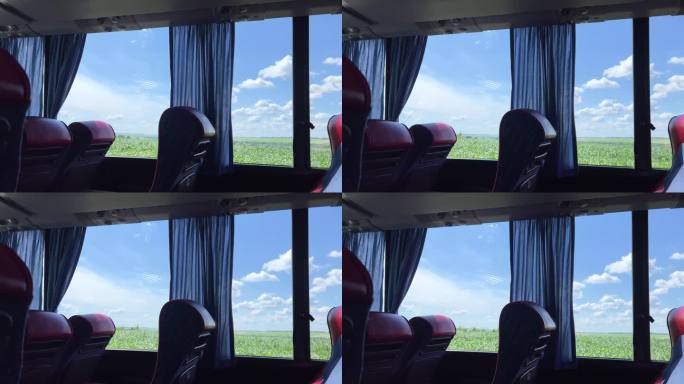 视频中公交车内的田野蓝天白云闪烁窗外空座位舒适的公共交通
