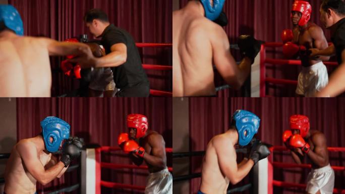 戴着拳击套装的白人年轻成年拳击手正在狠狠地把非洲年轻成年拳击手推到拳击台的turnbuckle上。