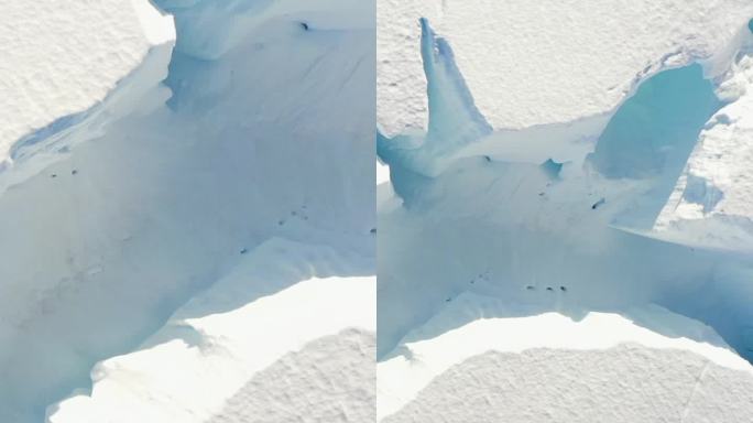 垂直镜头特写巨大的冰山在南极的南极海洋。