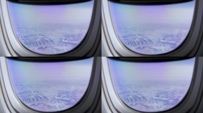 从飞机上看北极的雪山和冰川