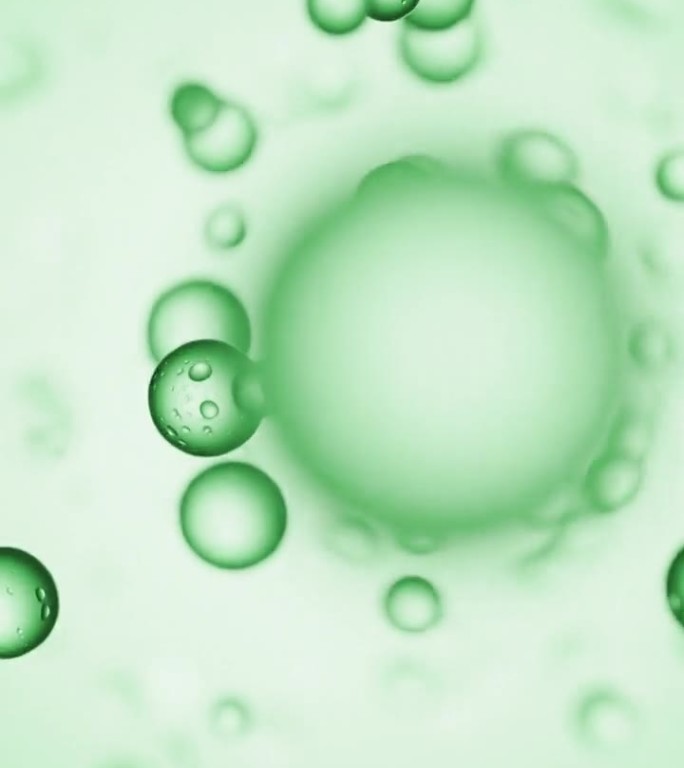 绿色背景上的气泡飞沫