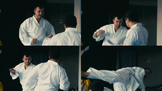 武术老师展示学生跆拳道回旋踢，在健身房训练