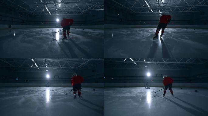 曲棍球运动员在冰上训练的高强度镜头，展示了专业技术并向守门员进球