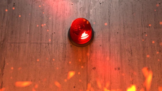红色紧急警笛在混凝土墙上亮起火焰