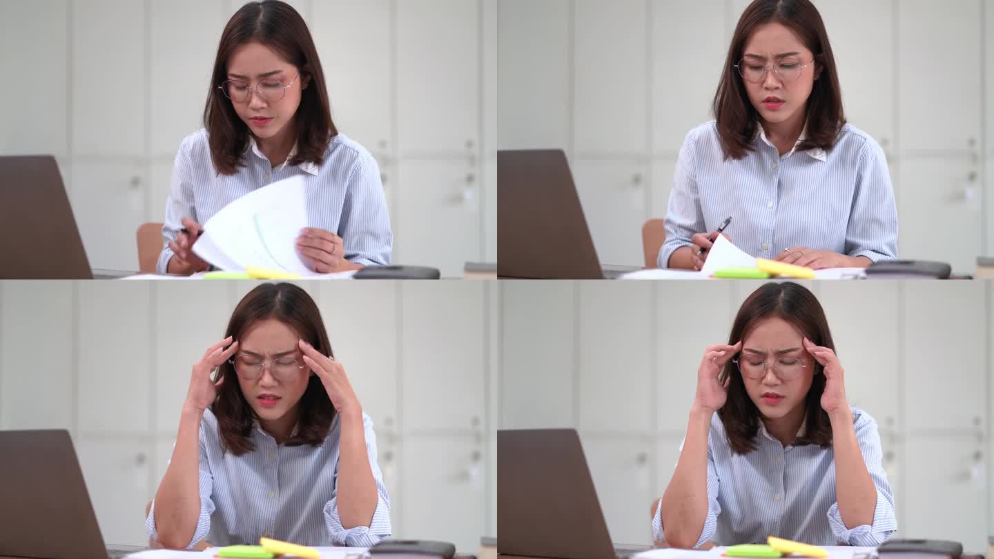 亚洲女性的压力很大，在办公室用笔记本电脑工作很烦，头疼