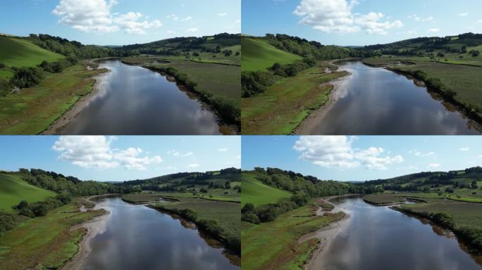 达特河，靠近托特尼斯，南德文郡，英格兰:无人机视图:达特河山谷在一个阳光明媚的夏日(剪辑1)