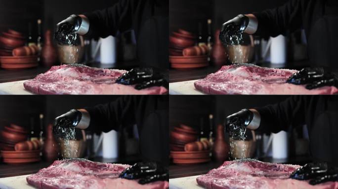 男厨师手撒盐肉块烹饪美食餐厅厨房特写慢镜头