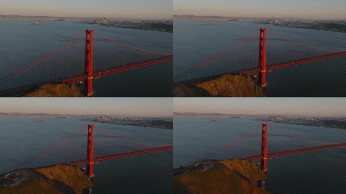 黄金时刻，著名的金门大桥、海湾和大都市被阳光照亮的航拍全景镜头。美国加州旧金山