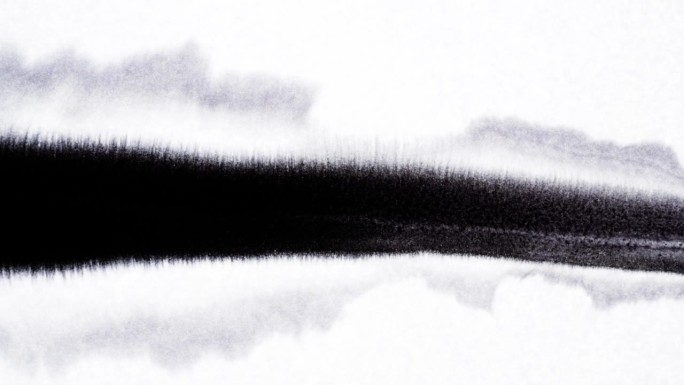 艺术家用画笔和纸画黑线