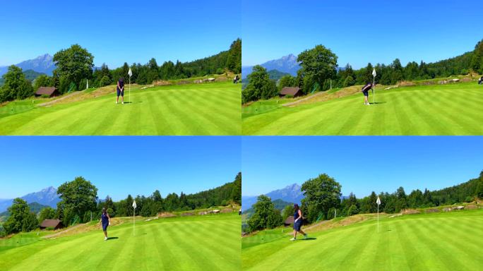 高尔夫球手在皮拉图斯峰和阳光的山景下将高尔夫球放入洞中