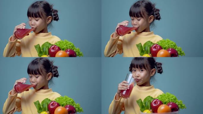 小女孩喝有机蔬果汁
