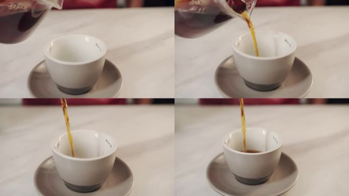 精品咖啡店里的咖啡师在做拉花。制作咖啡。