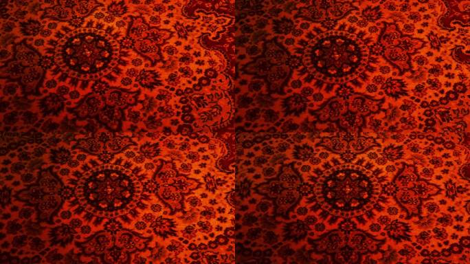 火光中的波斯地毯红色地毯实拍素材