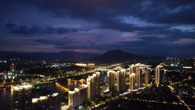 福建漳州城市夕阳晚霞夜幕降临夜景灯光航拍