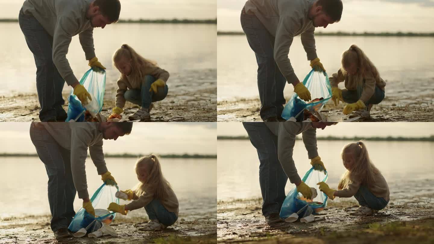 小女孩和她的爸爸在湖边捡垃圾，把塑料垃圾放进袋子里，生态