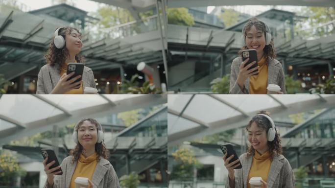 亚洲妇女在市区使用手机。