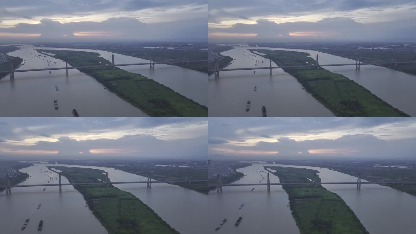 晚霞时河内红河上现代大桥的航拍视频