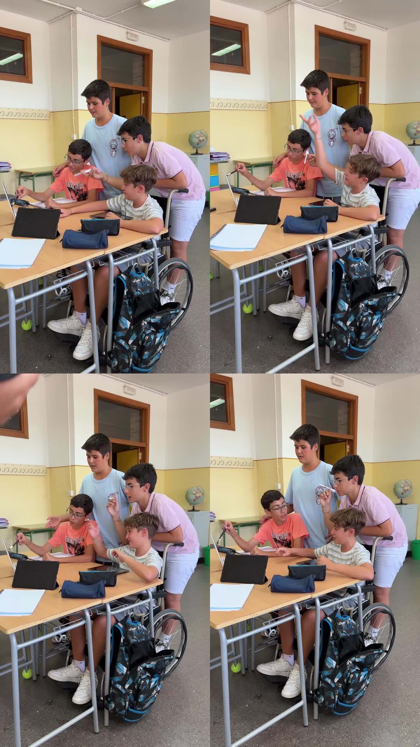 学龄前儿童在课堂上用笔记本电脑和数码平板电脑分组学习。返校理念