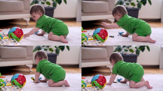 好奇的小男孩在散落的玩具和书旁边的白色毛绒地毯上爬行