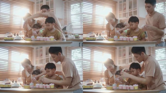 家庭自制的幸福:亚洲家庭在他们的厨房里烹饪甜蜜的回忆。