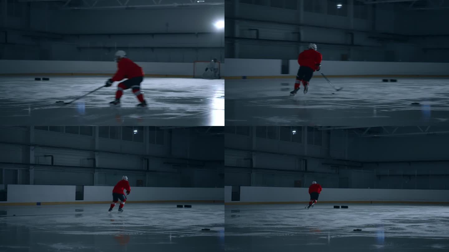 一名熟练的冰球运动员身穿红色运动衫，在黑暗的冰场上训练，避开障碍物并进球的高强度镜头