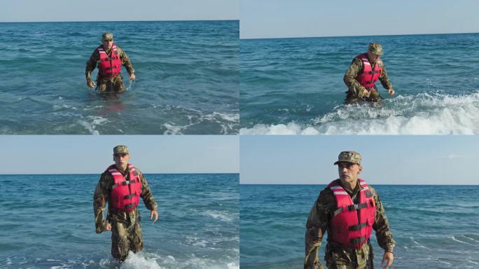 美国海军陆战队士兵从海水中出来