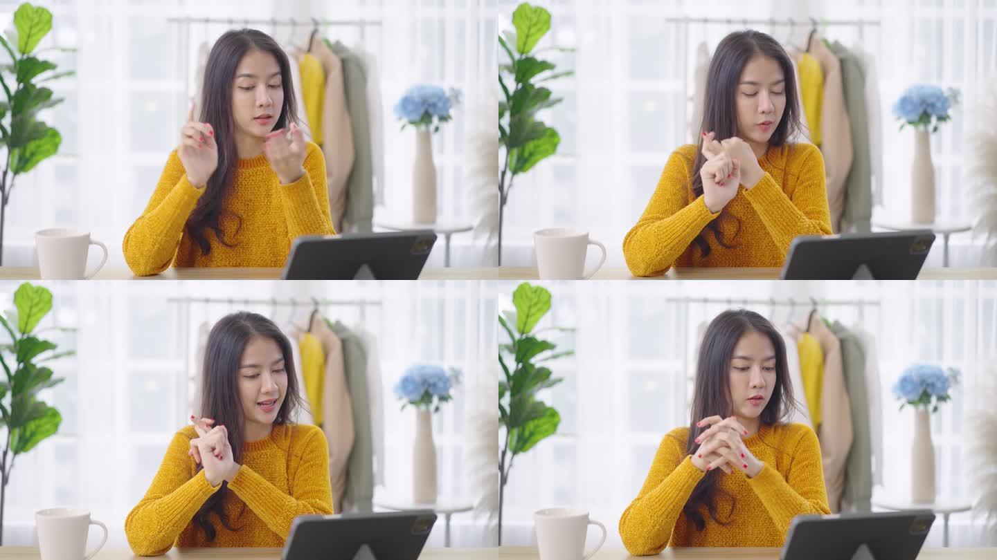 POV年轻的亚洲女性在网上对着镜头谈论工作