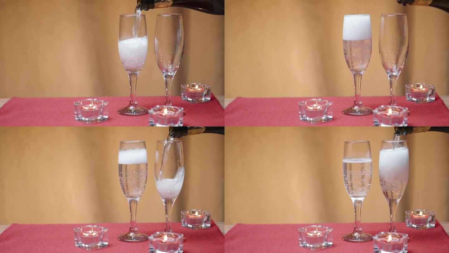 浪漫的两人桌。我把香槟酒倒进两个杯子里。红色桌子上的蜡烛。